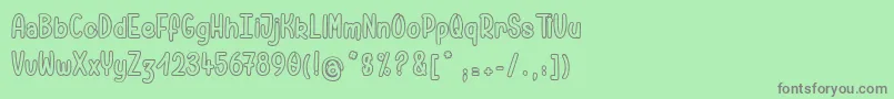 フォントPamelaWantsToRide – 緑の背景に灰色の文字