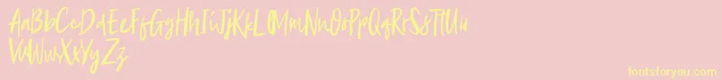 Aescudos Font – Yellow Fonts on Pink Background