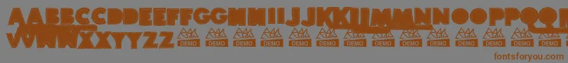 Więcej informacji o czcionce BordadosDemo Czcionka BordadosDemo – brązowe czcionki na szarym tle