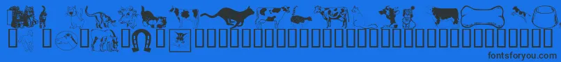 Wmanimals1-Schriftart – Schwarze Schriften auf blauem Hintergrund