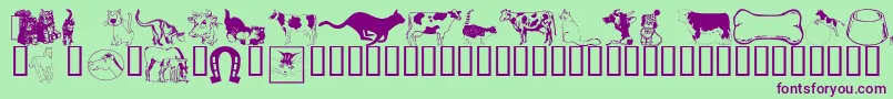 Czcionka Wmanimals1 – fioletowe czcionki na zielonym tle