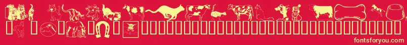フォントWmanimals1 – 黄色の文字、赤い背景