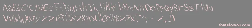 Travesty Font – Pink Fonts on Gray Background
