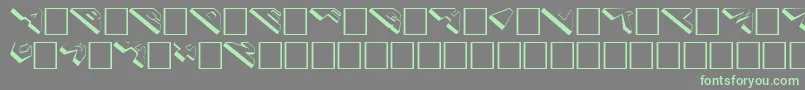 Cosmoscaps Font – Green Fonts on Gray Background