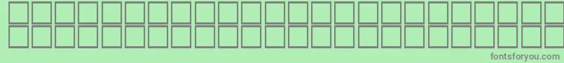 OusbouhItalic Font – Gray Fonts on Green Background
