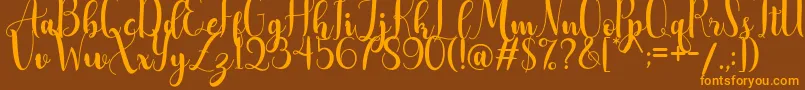AdreenascriptDemo Font – Orange Fonts on Brown Background