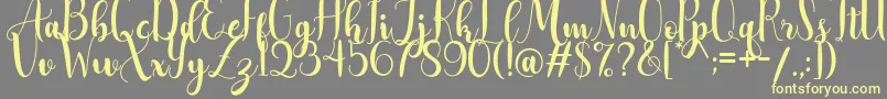 AdreenascriptDemo Font – Yellow Fonts on Gray Background