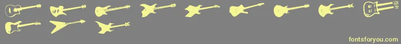 フォントScreaminguitar – 黄色のフォント、灰色の背景