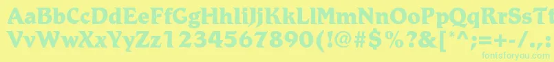 RomicstdExtrabold Font – Green Fonts on Yellow Background