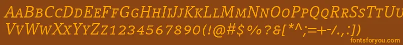 CompatilLetterLtComItalicSmallCaps Font – Orange Fonts on Brown Background